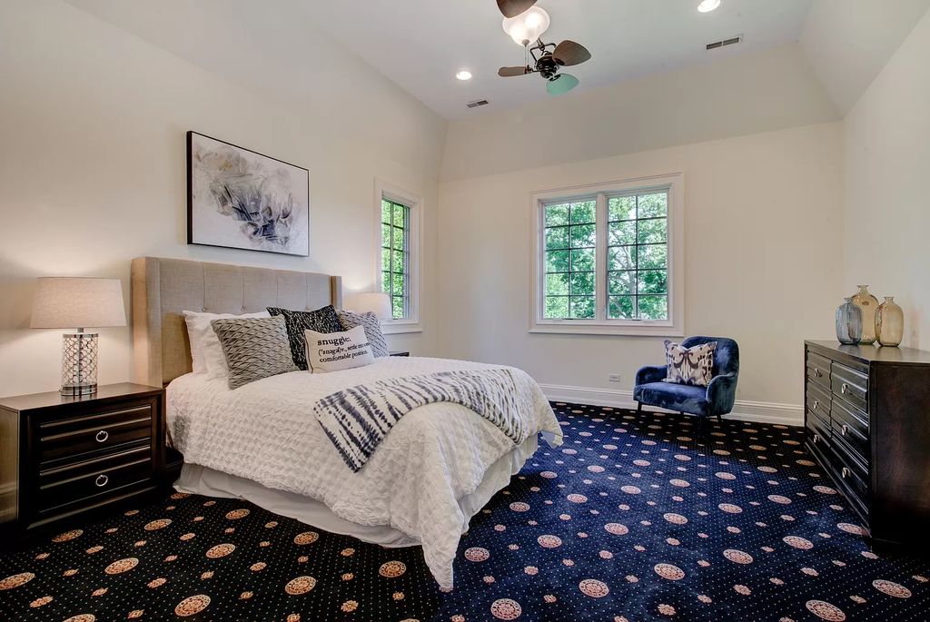 The Home in Winnetka is surrounded with picturesque perennial flower and organic vegetable gardens, lush grounds, now available for sale. This home located at 102 Longmeadow Rd, Winnetka, Illinois