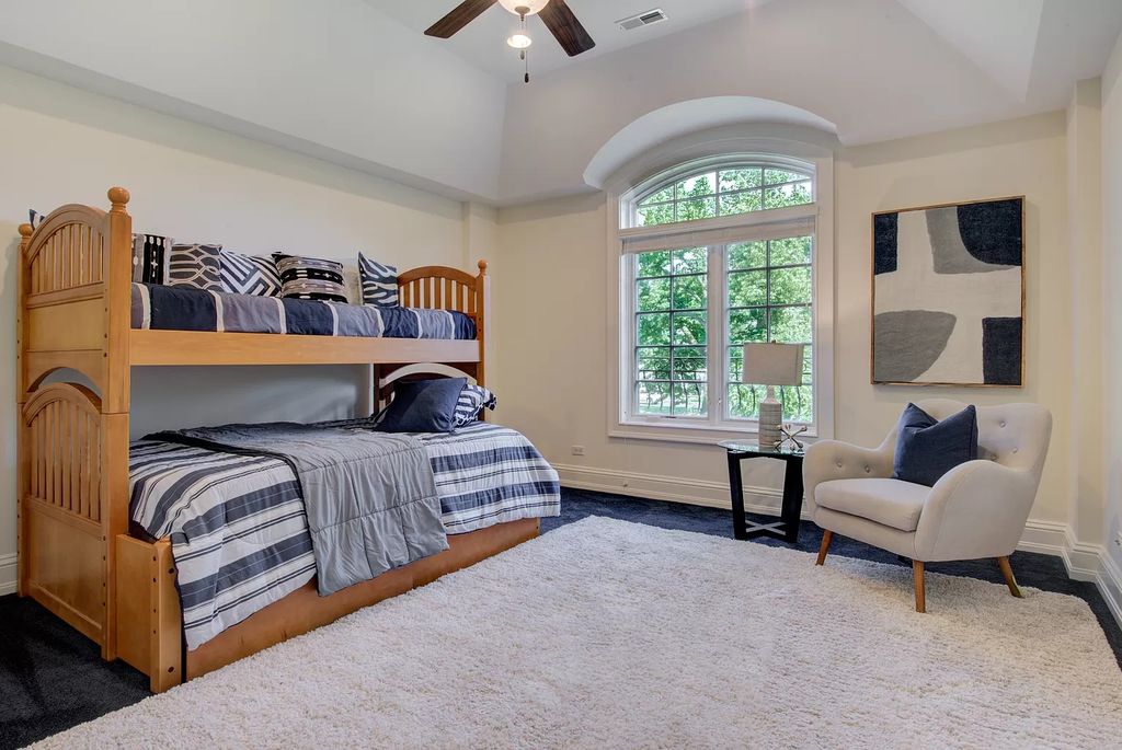 The Home in Winnetka is surrounded with picturesque perennial flower and organic vegetable gardens, lush grounds, now available for sale. This home located at 102 Longmeadow Rd, Winnetka, Illinois