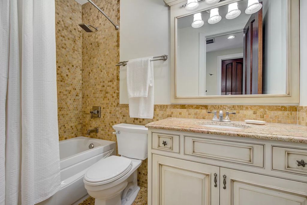 The Home in Winnetka is surrounded with picturesque perennial flower and organic vegetable gardens, lush grounds, now available for sale. This home located at 102 Longmeadow Rd, Winnetka, Illinois