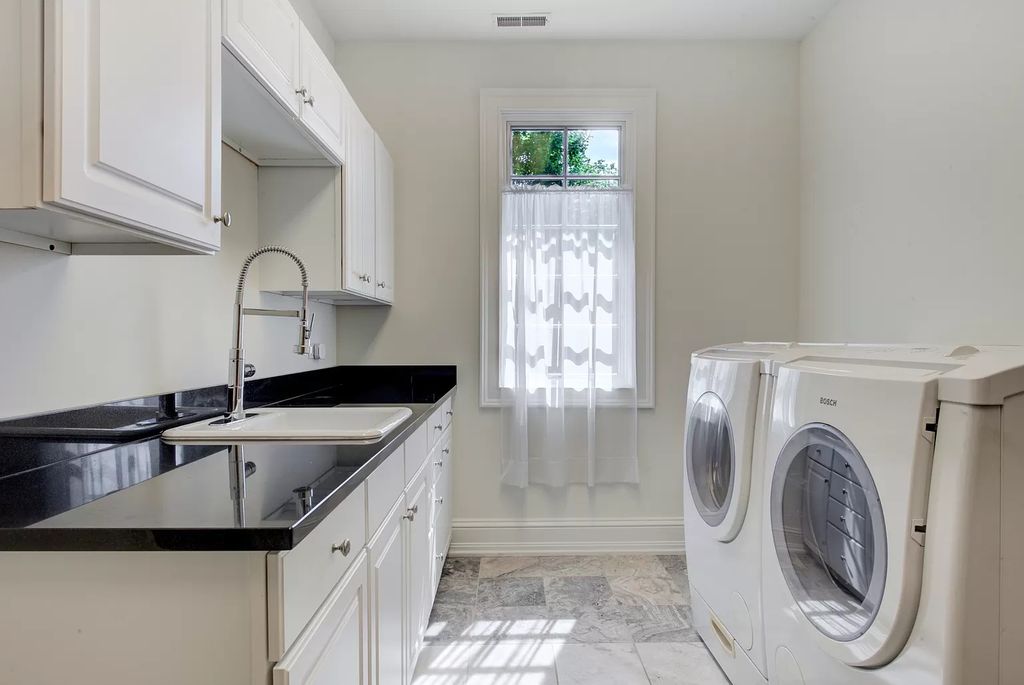 The Home in Winnetka is surrounded with picturesque perennial flower and organic vegetable gardens, lush grounds, now available for sale. This home located at 102 Longmeadow Rd, Winnetka, Illinois