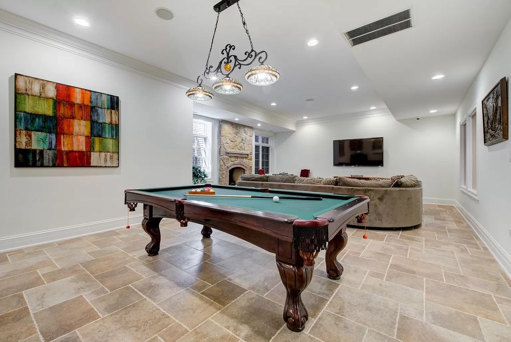 The Home in Winnetka is surrounded with picturesque perennial flower and organic vegetable gardens, lush grounds, now available for sale. This home located at 102 Longmeadow Rd, Winnetka, Illinois
