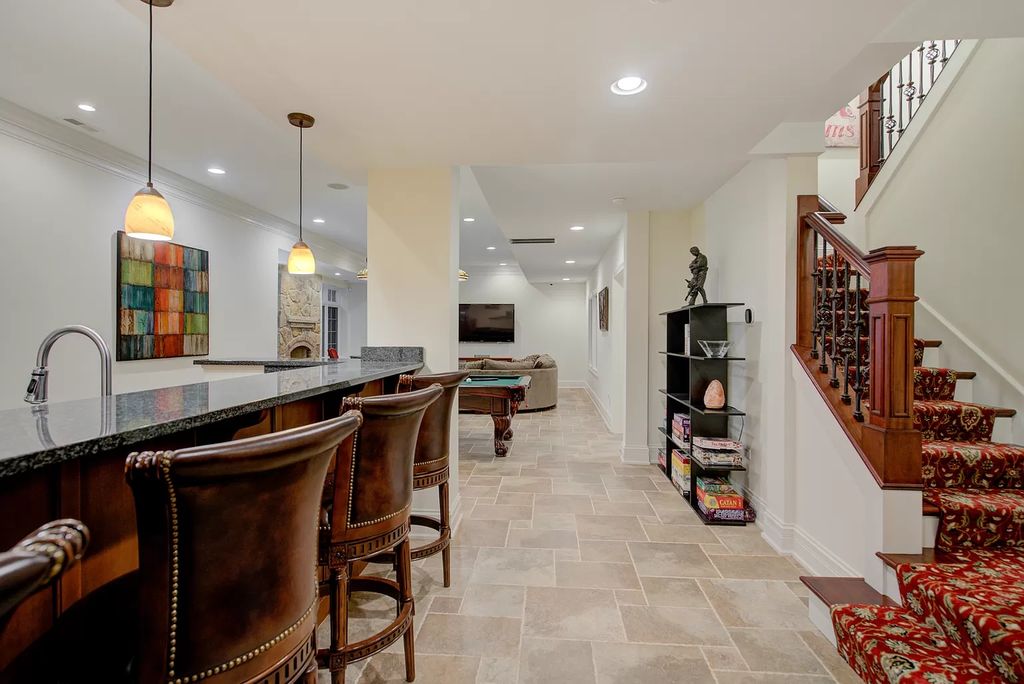 The Home in Winnetka is surrounded with picturesque perennial flower and organic vegetable gardens, lush grounds, now available for sale. This home located at 102 Longmeadow Rd, Winnetka, Illinois