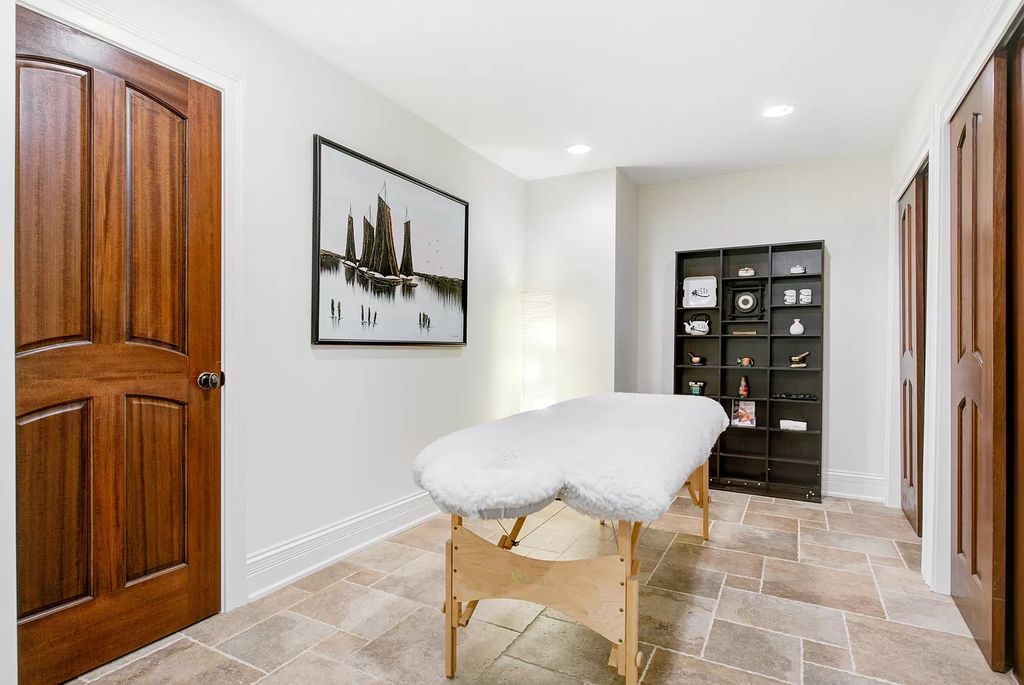 The Home in Winnetka is surrounded with picturesque perennial flower and organic vegetable gardens, lush grounds, now available for sale. This home located at 102 Longmeadow Rd, Winnetka, Illinois