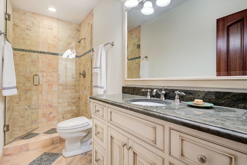 The Home in Winnetka is surrounded with picturesque perennial flower and organic vegetable gardens, lush grounds, now available for sale. This home located at 102 Longmeadow Rd, Winnetka, Illinois