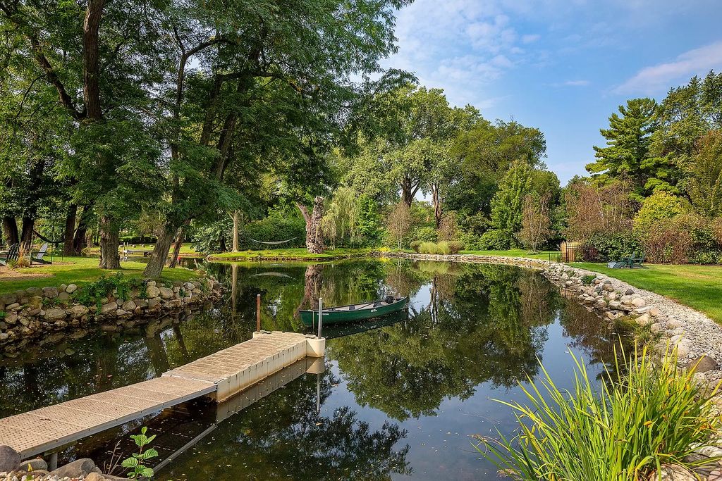 The Home in Winnetka is surrounded with picturesque perennial flower and organic vegetable gardens, lush grounds, now available for sale. This home located at 102 Longmeadow Rd, Winnetka, Illinois