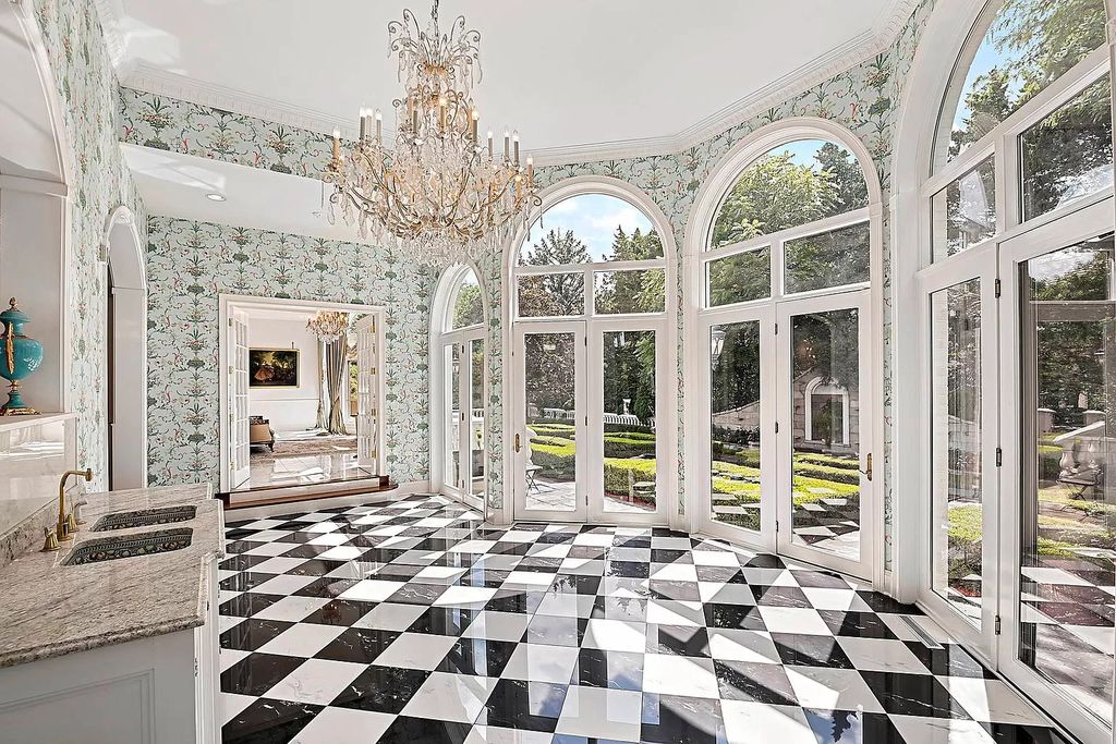 The Estate in Oak Brook is a luxurious home surrounded by beautifully manicured professionally landscaped gardens now available for sale. This home located at 704 Deer Trail Ln, Oak Brook, Illinois; offering 08 bedrooms and 10 bathrooms with 16,981 square feet of living spaces.