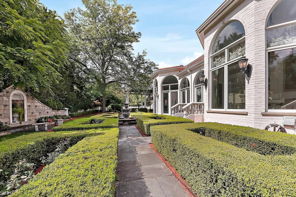 The Estate in Oak Brook is a luxurious home surrounded by beautifully manicured professionally landscaped gardens now available for sale. This home located at 704 Deer Trail Ln, Oak Brook, Illinois; offering 08 bedrooms and 10 bathrooms with 16,981 square feet of living spaces.