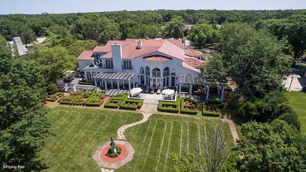The Estate in Oak Brook is a luxurious home surrounded by beautifully manicured professionally landscaped gardens now available for sale. This home located at 704 Deer Trail Ln, Oak Brook, Illinois; offering 08 bedrooms and 10 bathrooms with 16,981 square feet of living spaces.