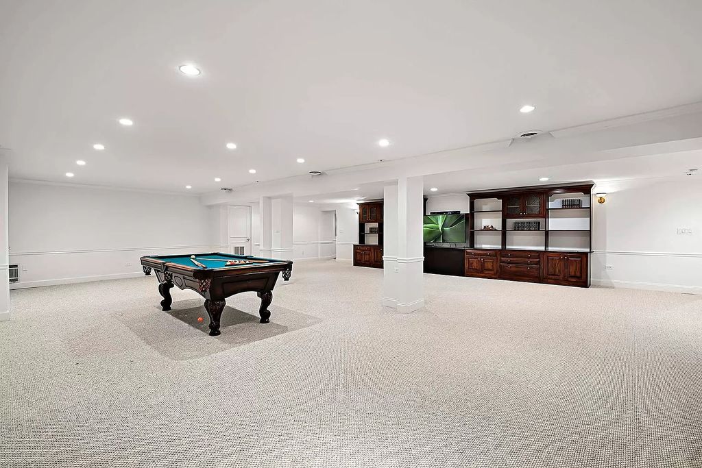 The Estate in Oak Brook is a luxurious home surrounded by beautifully manicured professionally landscaped gardens now available for sale. This home located at 704 Deer Trail Ln, Oak Brook, Illinois; offering 08 bedrooms and 10 bathrooms with 16,981 square feet of living spaces.