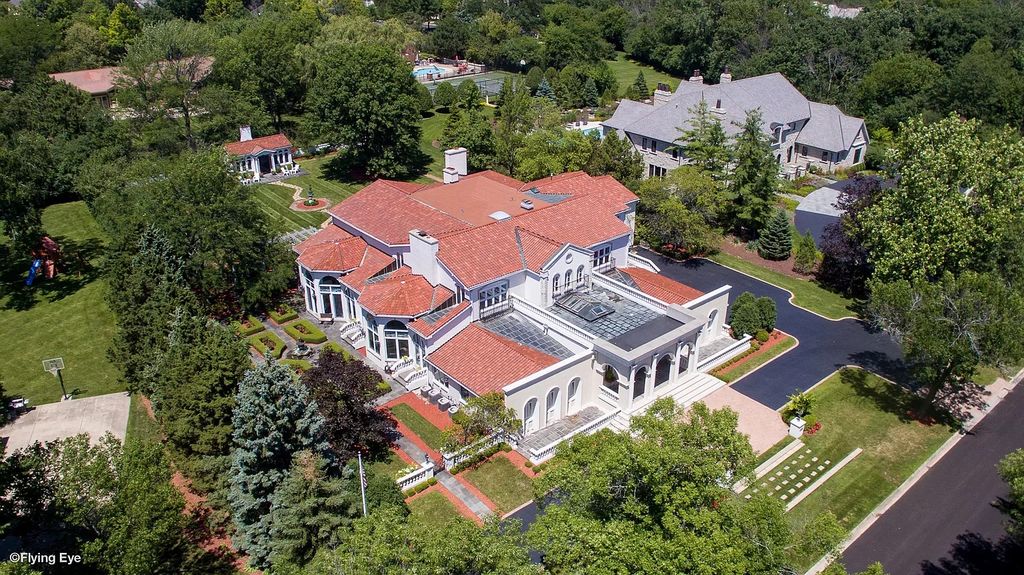 The Estate in Oak Brook is a luxurious home surrounded by beautifully manicured professionally landscaped gardens now available for sale. This home located at 704 Deer Trail Ln, Oak Brook, Illinois; offering 08 bedrooms and 10 bathrooms with 16,981 square feet of living spaces.