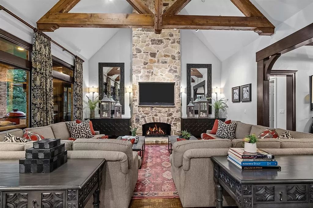 The Estate in Argyle, a stunning home with tranquil setting and a stocked pond offering outdoor oasis with ample covered area with fireplace and both a barbecue and smoker perfect for entertaining is now available for sale. This home located at 1000 Roadrunner Rd, Argyle, Texas