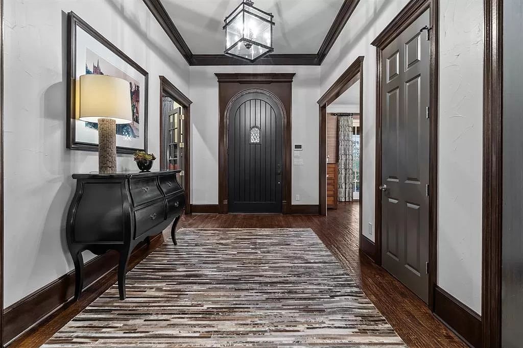 The Estate in Argyle, a stunning home with tranquil setting and a stocked pond offering outdoor oasis with ample covered area with fireplace and both a barbecue and smoker perfect for entertaining is now available for sale. This home located at 1000 Roadrunner Rd, Argyle, Texas