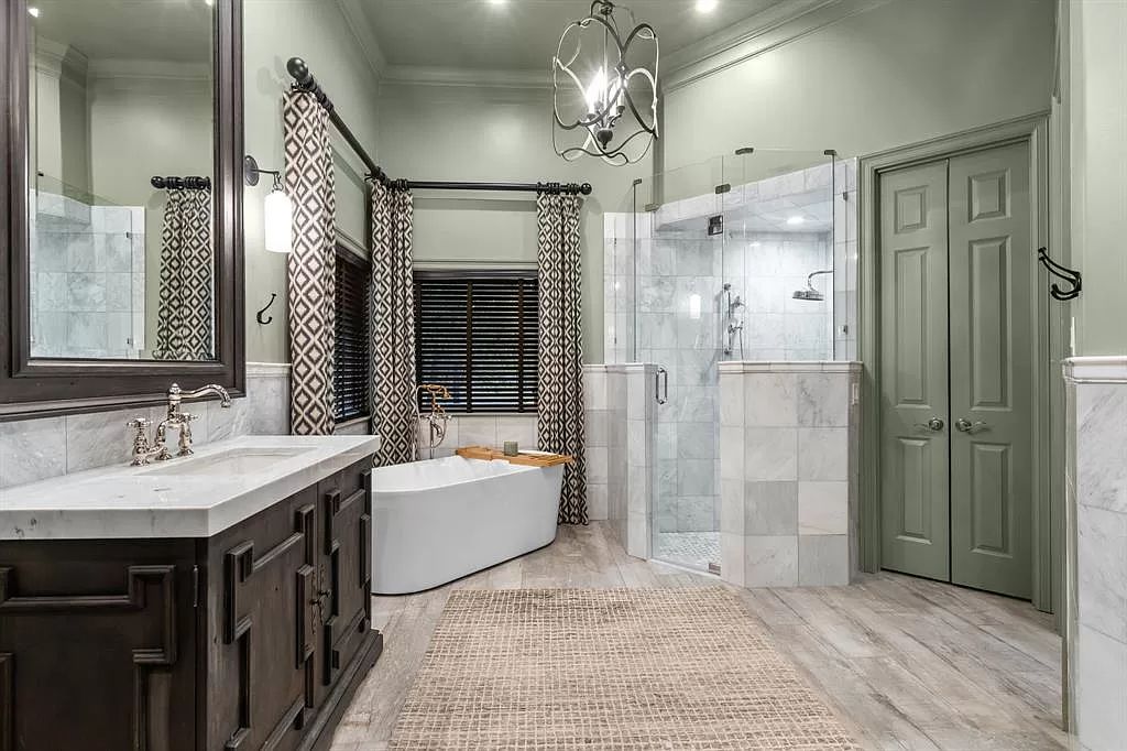 The Estate in Argyle, a stunning home with tranquil setting and a stocked pond offering outdoor oasis with ample covered area with fireplace and both a barbecue and smoker perfect for entertaining is now available for sale. This home located at 1000 Roadrunner Rd, Argyle, Texas