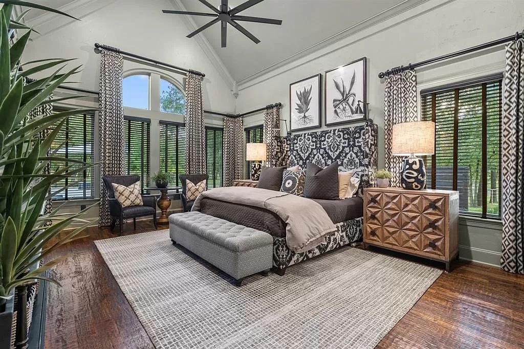 The Estate in Argyle, a stunning home with tranquil setting and a stocked pond offering outdoor oasis with ample covered area with fireplace and both a barbecue and smoker perfect for entertaining is now available for sale. This home located at 1000 Roadrunner Rd, Argyle, Texas
