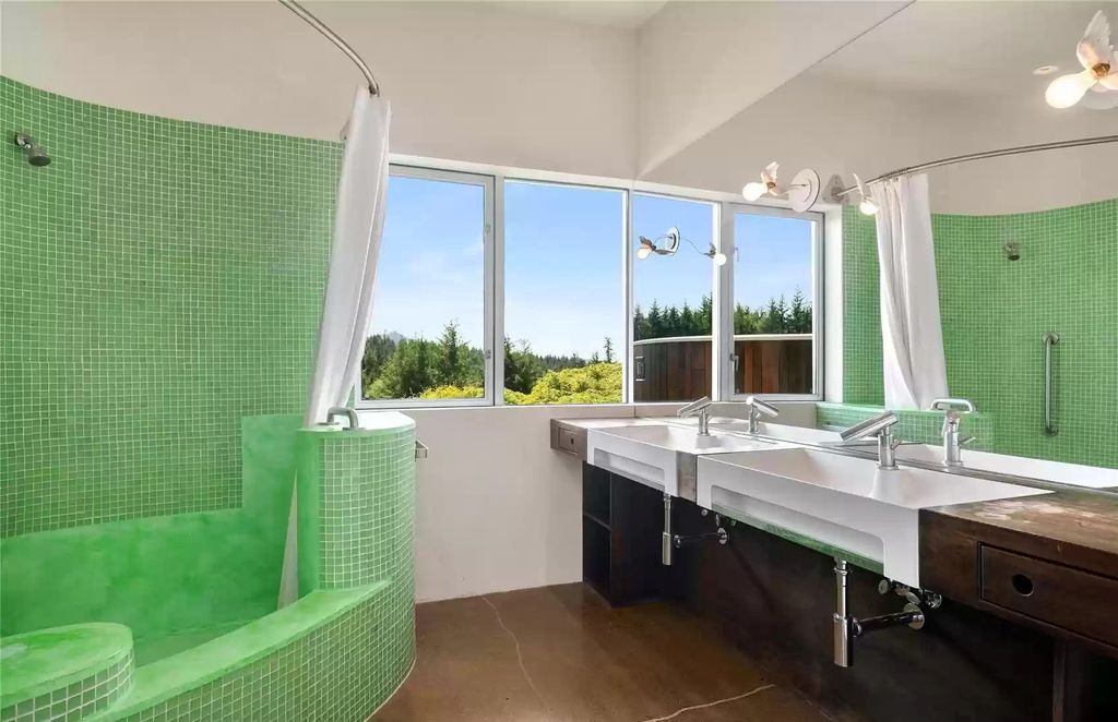 The Home in Tenino  atop 85 acres of stunning land with sustainable gardens, saltwater pool and archery range, now available for sale. This home located at 7415 Nanitch Lane SE, Tenino, Washington