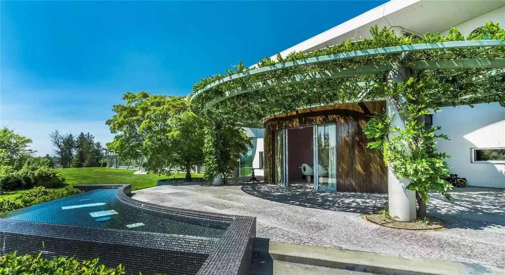 The Home in Tenino  atop 85 acres of stunning land with sustainable gardens, saltwater pool and archery range, now available for sale. This home located at 7415 Nanitch Lane SE, Tenino, Washington