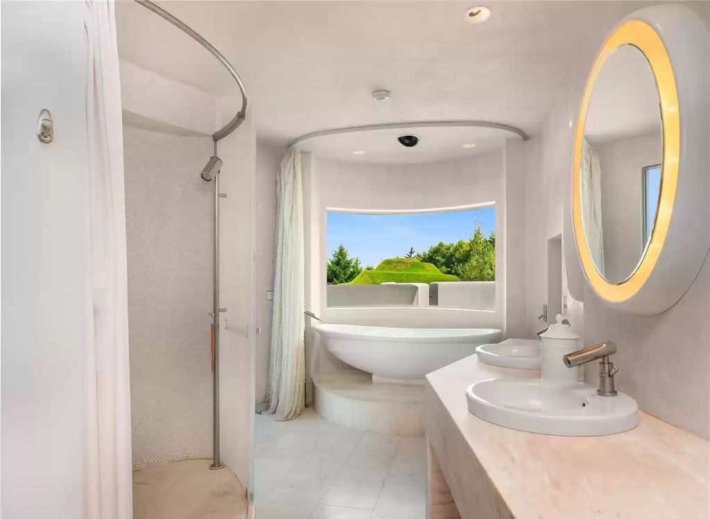 The Home in Tenino  atop 85 acres of stunning land with sustainable gardens, saltwater pool and archery range, now available for sale. This home located at 7415 Nanitch Lane SE, Tenino, Washington