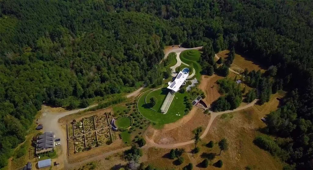 The Home in Tenino  atop 85 acres of stunning land with sustainable gardens, saltwater pool and archery range, now available for sale. This home located at 7415 Nanitch Lane SE, Tenino, Washington