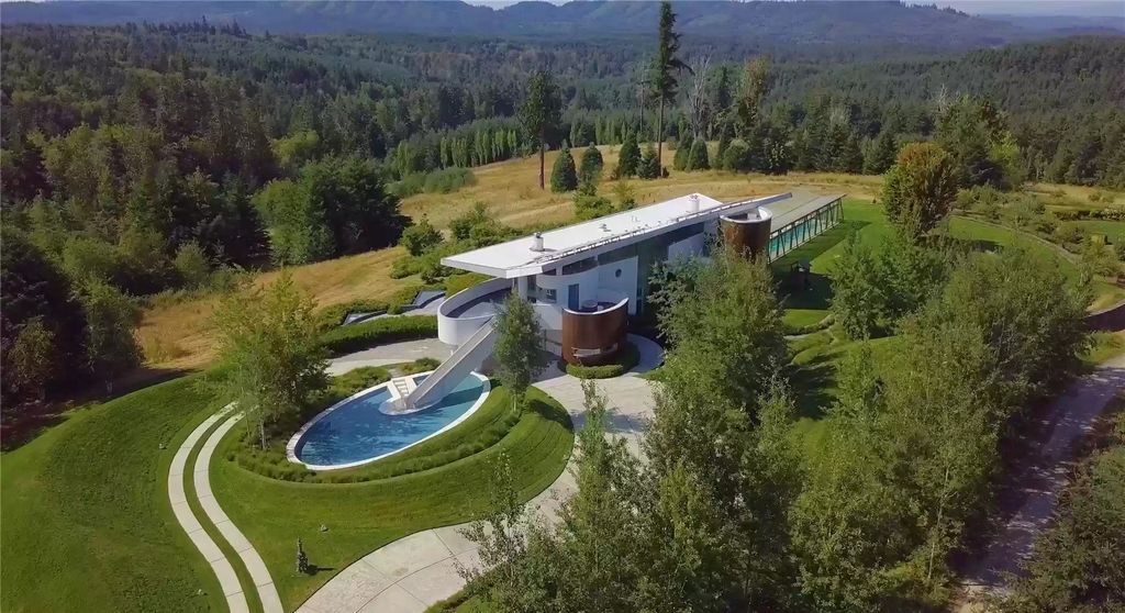 The Home in Tenino  atop 85 acres of stunning land with sustainable gardens, saltwater pool and archery range, now available for sale. This home located at 7415 Nanitch Lane SE, Tenino, Washington