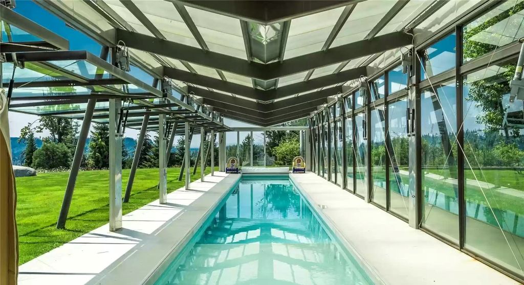 The Home in Tenino  atop 85 acres of stunning land with sustainable gardens, saltwater pool and archery range, now available for sale. This home located at 7415 Nanitch Lane SE, Tenino, Washington