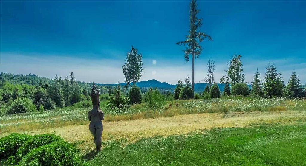 The Home in Tenino  atop 85 acres of stunning land with sustainable gardens, saltwater pool and archery range, now available for sale. This home located at 7415 Nanitch Lane SE, Tenino, Washington