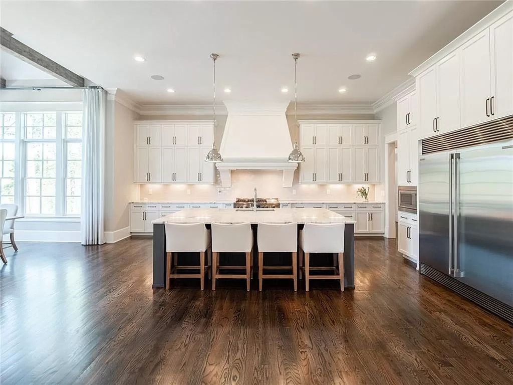 The Estate in Milton is a luxurious home featuring open floor plan and breathtaking outdoor area now available for sale. This home located at 16146 Belford Dr, Milton, Georgia; offering 07 bedrooms and 09 bathrooms with 8,979 square feet of living spaces.
