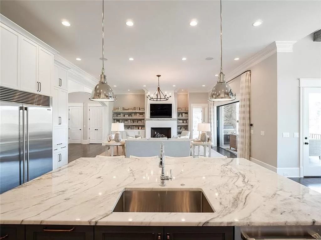 The Estate in Milton is a luxurious home featuring open floor plan and breathtaking outdoor area now available for sale. This home located at 16146 Belford Dr, Milton, Georgia; offering 07 bedrooms and 09 bathrooms with 8,979 square feet of living spaces.