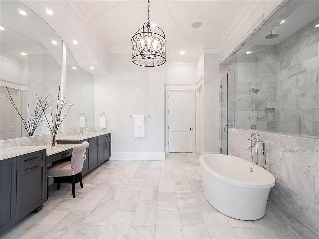 The Estate in Milton is a luxurious home featuring open floor plan and breathtaking outdoor area now available for sale. This home located at 16146 Belford Dr, Milton, Georgia; offering 07 bedrooms and 09 bathrooms with 8,979 square feet of living spaces.
