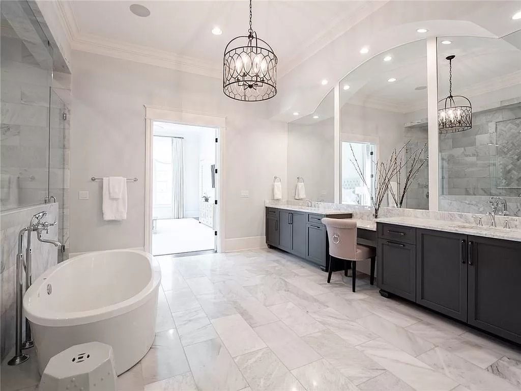 The Estate in Milton is a luxurious home featuring open floor plan and breathtaking outdoor area now available for sale. This home located at 16146 Belford Dr, Milton, Georgia; offering 07 bedrooms and 09 bathrooms with 8,979 square feet of living spaces.