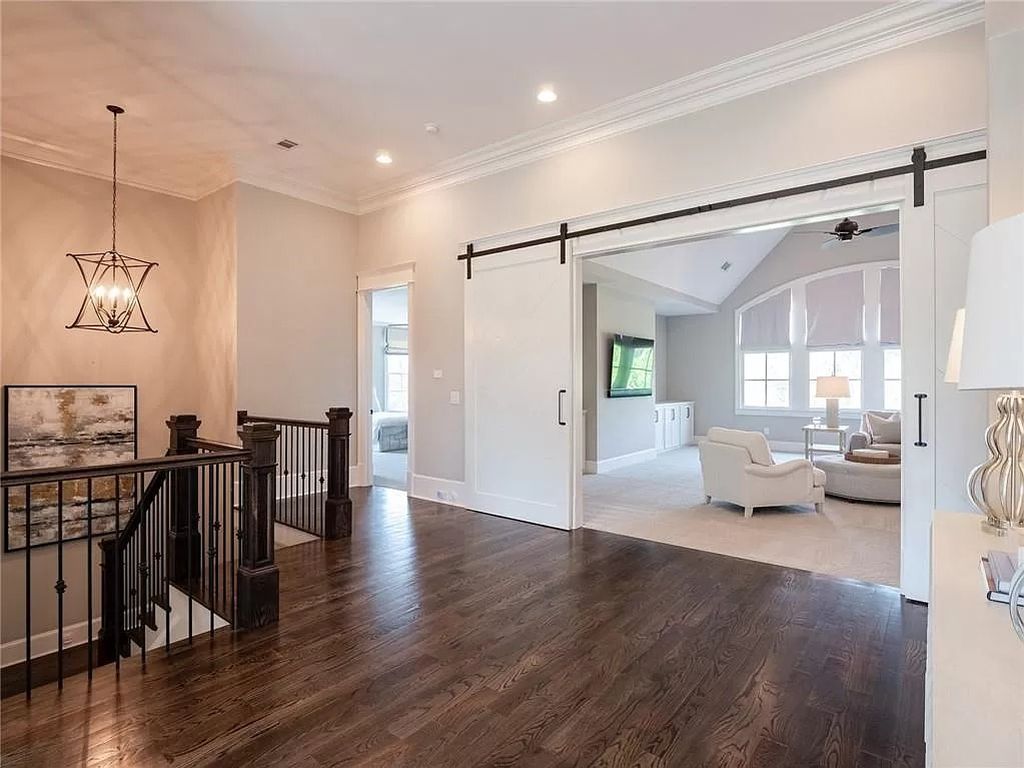 The Estate in Milton is a luxurious home featuring open floor plan and breathtaking outdoor area now available for sale. This home located at 16146 Belford Dr, Milton, Georgia; offering 07 bedrooms and 09 bathrooms with 8,979 square feet of living spaces.