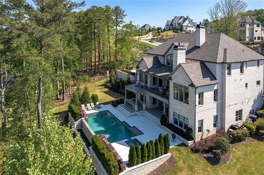 The Estate in Milton is a luxurious home featuring open floor plan and breathtaking outdoor area now available for sale. This home located at 16146 Belford Dr, Milton, Georgia; offering 07 bedrooms and 09 bathrooms with 8,979 square feet of living spaces.