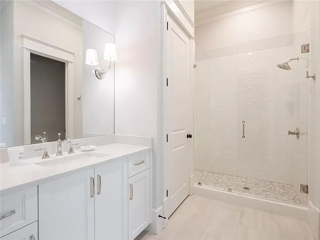 The Estate in Milton is a luxurious home featuring open floor plan and breathtaking outdoor area now available for sale. This home located at 16146 Belford Dr, Milton, Georgia; offering 07 bedrooms and 09 bathrooms with 8,979 square feet of living spaces.