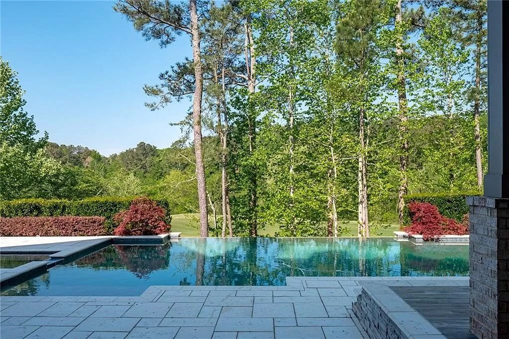 The Estate in Milton is a luxurious home featuring open floor plan and breathtaking outdoor area now available for sale. This home located at 16146 Belford Dr, Milton, Georgia; offering 07 bedrooms and 09 bathrooms with 8,979 square feet of living spaces.
