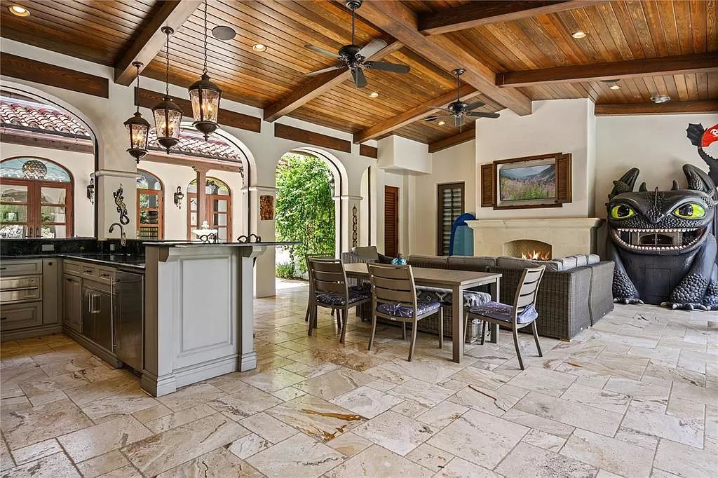 The Estate in Orlando, a one of a kind home in the coveted Carolwood neighborhood in Golden Oak at Walt Disney World Resort offering beautiful outdoor areas with a resort pool and an expansive covered courtyard is now available for sale. This home located at 10151 Enchanted Oak Dr, Orlando, Florida