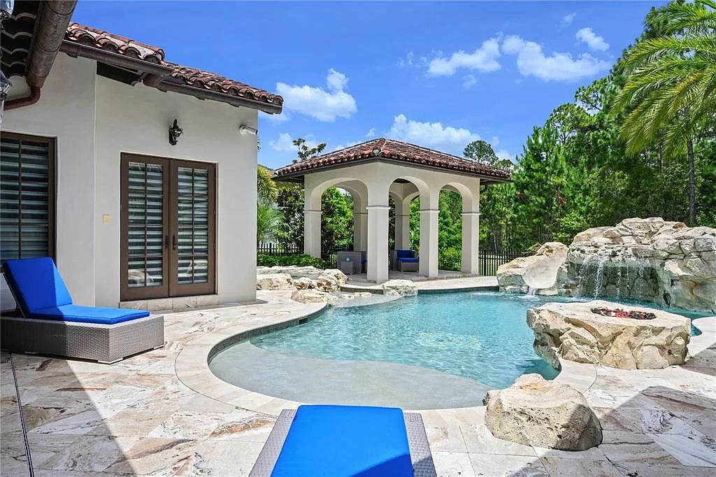 The Estate in Orlando, a one of a kind home in the coveted Carolwood neighborhood in Golden Oak at Walt Disney World Resort offering beautiful outdoor areas with a resort pool and an expansive covered courtyard is now available for sale. This home located at 10151 Enchanted Oak Dr, Orlando, Florida