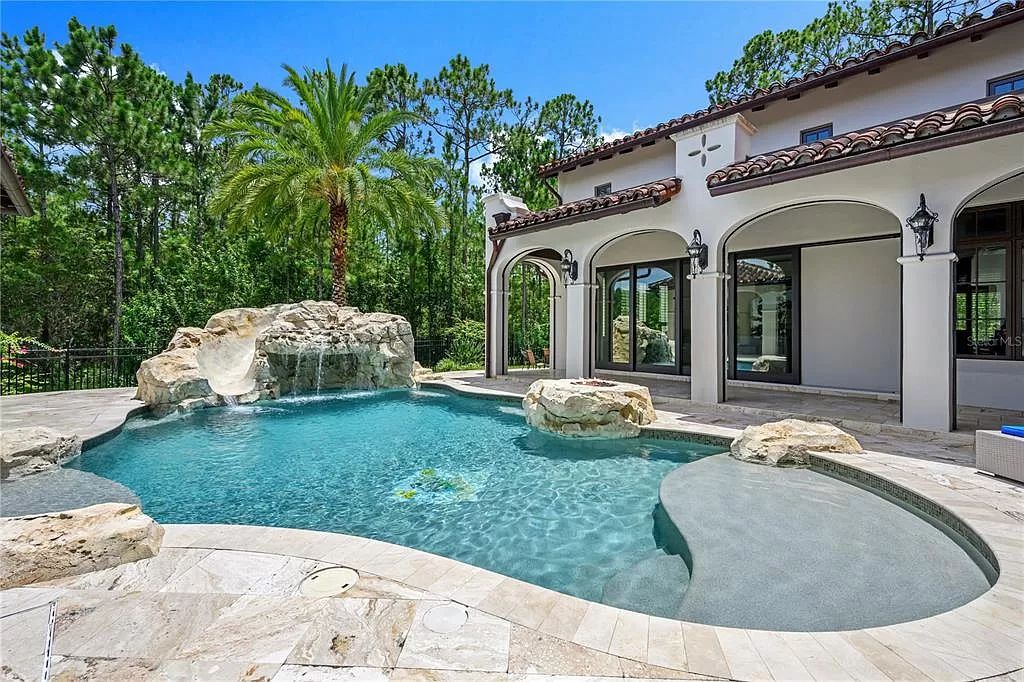 The Estate in Orlando, a one of a kind home in the coveted Carolwood neighborhood in Golden Oak at Walt Disney World Resort offering beautiful outdoor areas with a resort pool and an expansive covered courtyard is now available for sale. This home located at 10151 Enchanted Oak Dr, Orlando, Florida