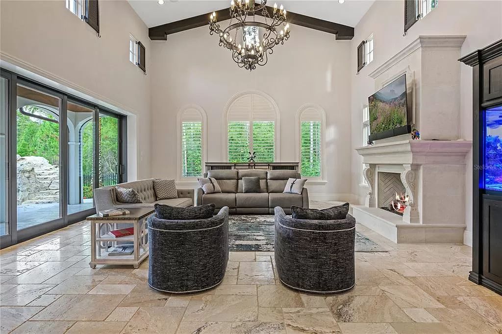 The Estate in Orlando, a one of a kind home in the coveted Carolwood neighborhood in Golden Oak at Walt Disney World Resort offering beautiful outdoor areas with a resort pool and an expansive covered courtyard is now available for sale. This home located at 10151 Enchanted Oak Dr, Orlando, Florida