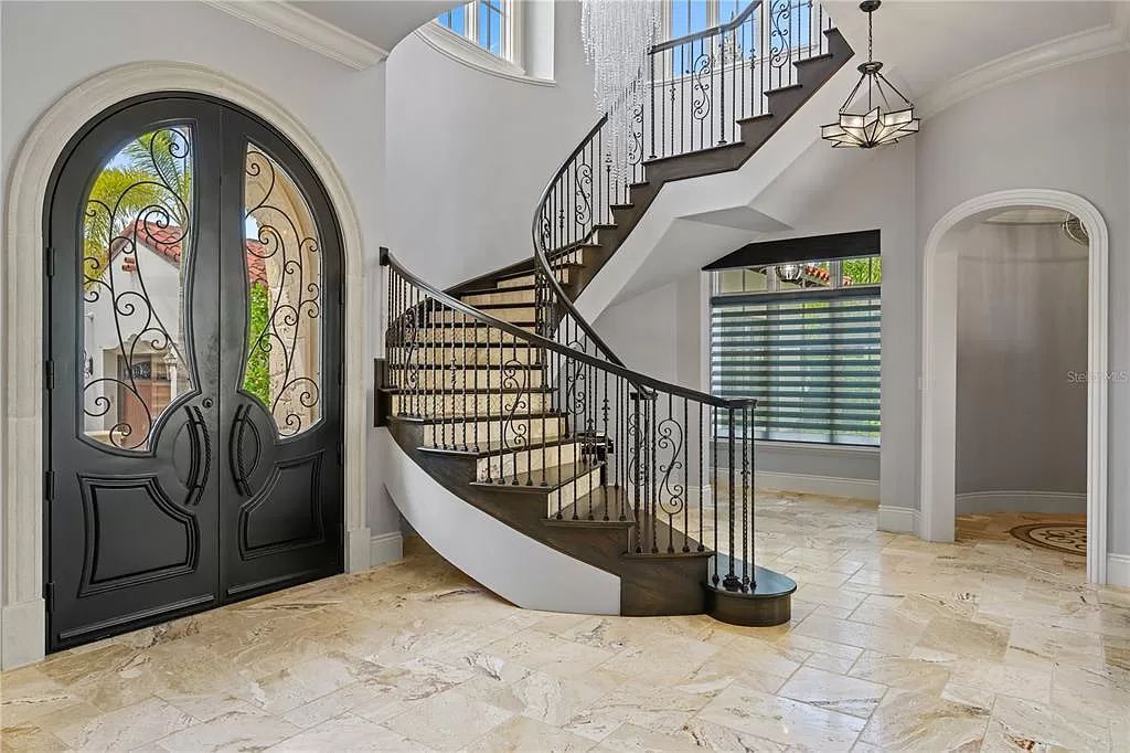 The Estate in Orlando, a one of a kind home in the coveted Carolwood neighborhood in Golden Oak at Walt Disney World Resort offering beautiful outdoor areas with a resort pool and an expansive covered courtyard is now available for sale. This home located at 10151 Enchanted Oak Dr, Orlando, Florida