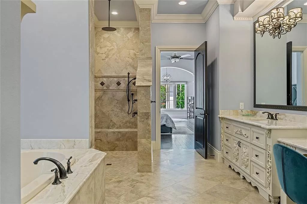 The Estate in Orlando, a one of a kind home in the coveted Carolwood neighborhood in Golden Oak at Walt Disney World Resort offering beautiful outdoor areas with a resort pool and an expansive covered courtyard is now available for sale. This home located at 10151 Enchanted Oak Dr, Orlando, Florida