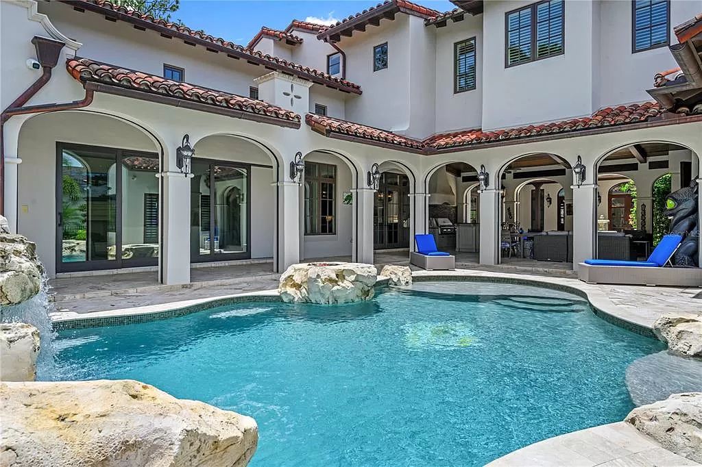 The Estate in Orlando, a one of a kind home in the coveted Carolwood neighborhood in Golden Oak at Walt Disney World Resort offering beautiful outdoor areas with a resort pool and an expansive covered courtyard is now available for sale. This home located at 10151 Enchanted Oak Dr, Orlando, Florida