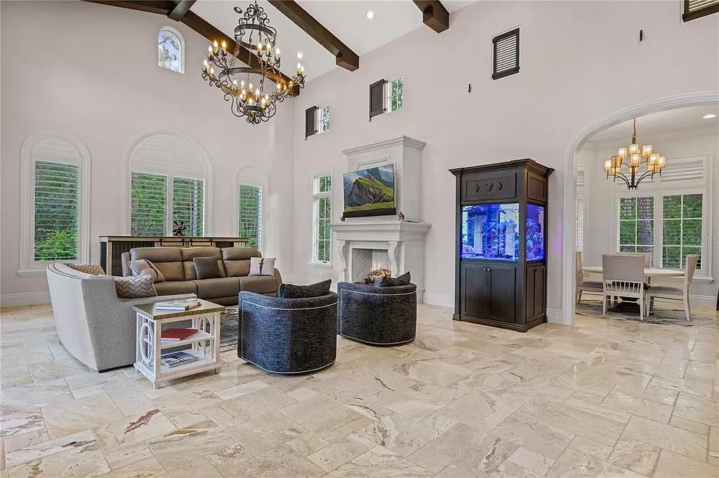 The Estate in Orlando, a one of a kind home in the coveted Carolwood neighborhood in Golden Oak at Walt Disney World Resort offering beautiful outdoor areas with a resort pool and an expansive covered courtyard is now available for sale. This home located at 10151 Enchanted Oak Dr, Orlando, Florida