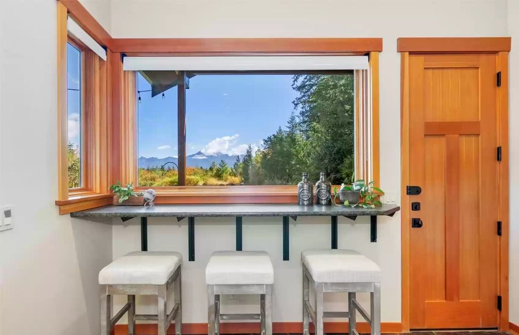 The Estate in North Bend is a luxurious home featuring gorgeous finishes and ideal spaces for a wide choice of entertainment now available for sale. This home located at 16331 Reserve Drive SE, North Bend, Washington; offering 04 bedrooms and 04 bathrooms with 5,710 square feet of living spaces. 