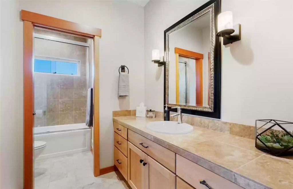 The Estate in North Bend is a luxurious home featuring gorgeous finishes and ideal spaces for a wide choice of entertainment now available for sale. This home located at 16331 Reserve Drive SE, North Bend, Washington; offering 04 bedrooms and 04 bathrooms with 5,710 square feet of living spaces. 