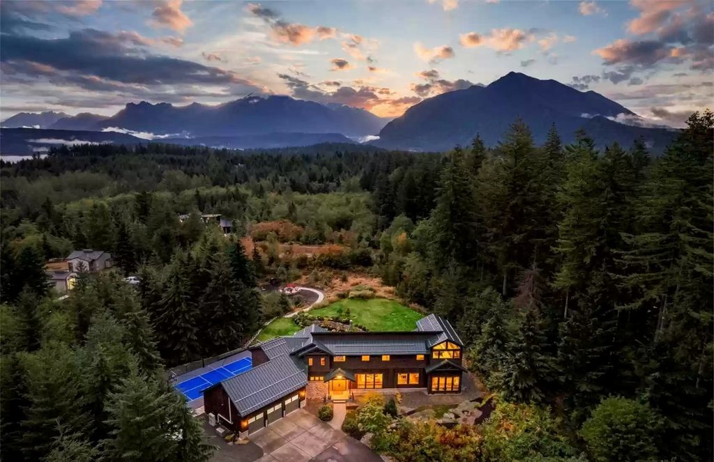 The Estate in North Bend is a luxurious home featuring gorgeous finishes and ideal spaces for a wide choice of entertainment now available for sale. This home located at 16331 Reserve Drive SE, North Bend, Washington; offering 04 bedrooms and 04 bathrooms with 5,710 square feet of living spaces. 