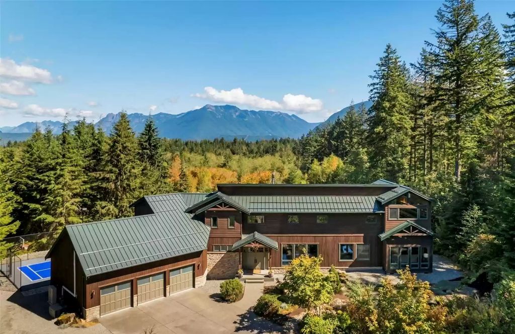 The Estate in North Bend is a luxurious home featuring gorgeous finishes and ideal spaces for a wide choice of entertainment now available for sale. This home located at 16331 Reserve Drive SE, North Bend, Washington; offering 04 bedrooms and 04 bathrooms with 5,710 square feet of living spaces. 
