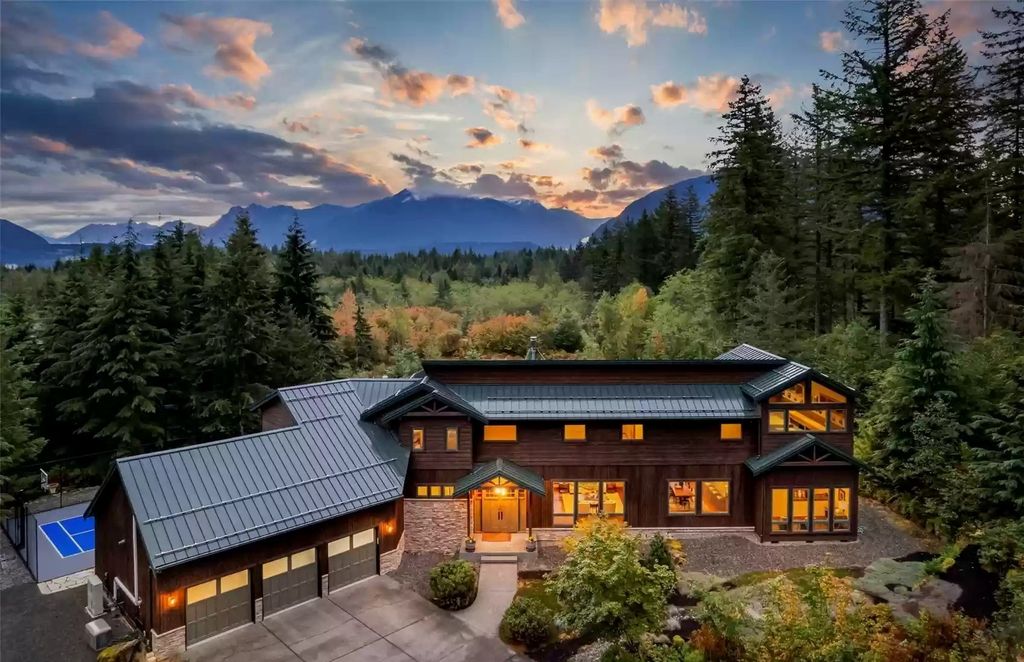 The Estate in North Bend is a luxurious home featuring gorgeous finishes and ideal spaces for a wide choice of entertainment now available for sale. This home located at 16331 Reserve Drive SE, North Bend, Washington; offering 04 bedrooms and 04 bathrooms with 5,710 square feet of living spaces. 