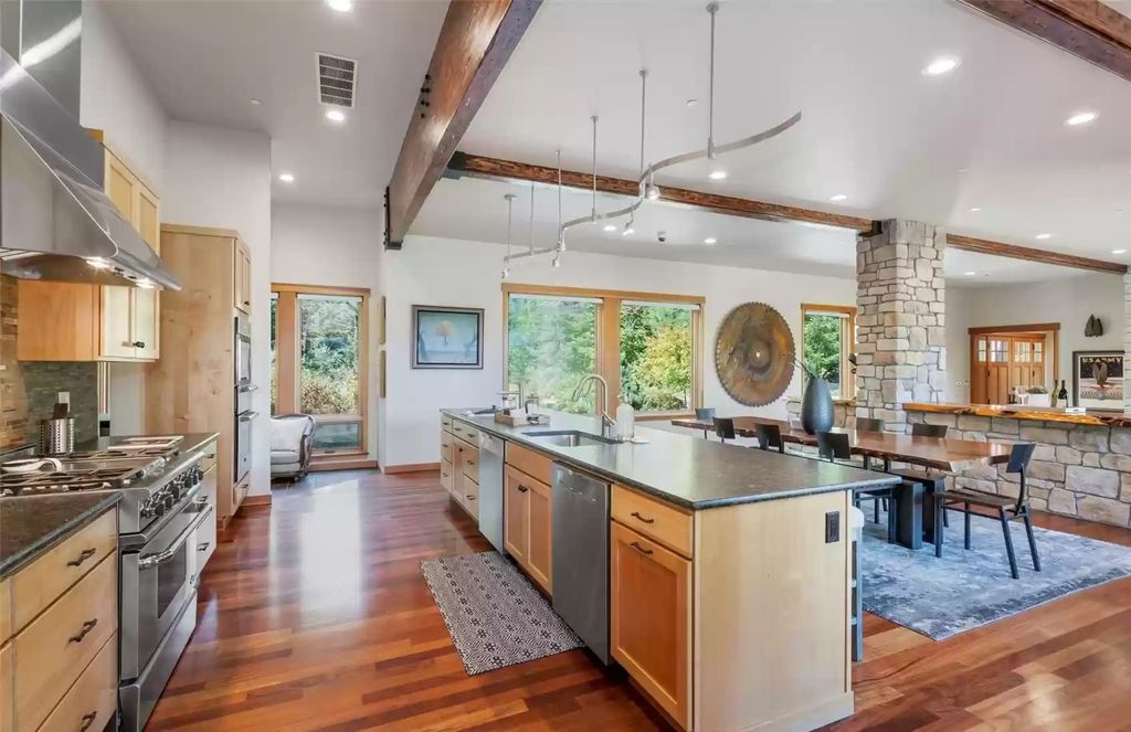 The Estate in North Bend is a luxurious home featuring gorgeous finishes and ideal spaces for a wide choice of entertainment now available for sale. This home located at 16331 Reserve Drive SE, North Bend, Washington; offering 04 bedrooms and 04 bathrooms with 5,710 square feet of living spaces. 