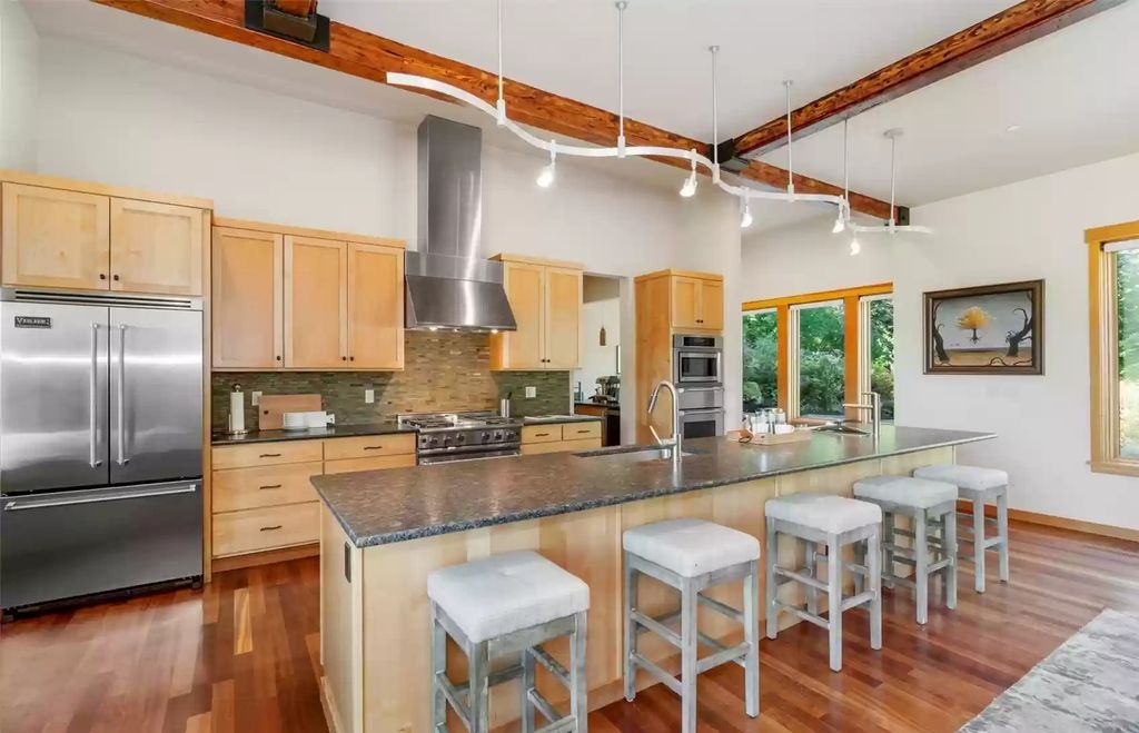 The Estate in North Bend is a luxurious home featuring gorgeous finishes and ideal spaces for a wide choice of entertainment now available for sale. This home located at 16331 Reserve Drive SE, North Bend, Washington; offering 04 bedrooms and 04 bathrooms with 5,710 square feet of living spaces. 