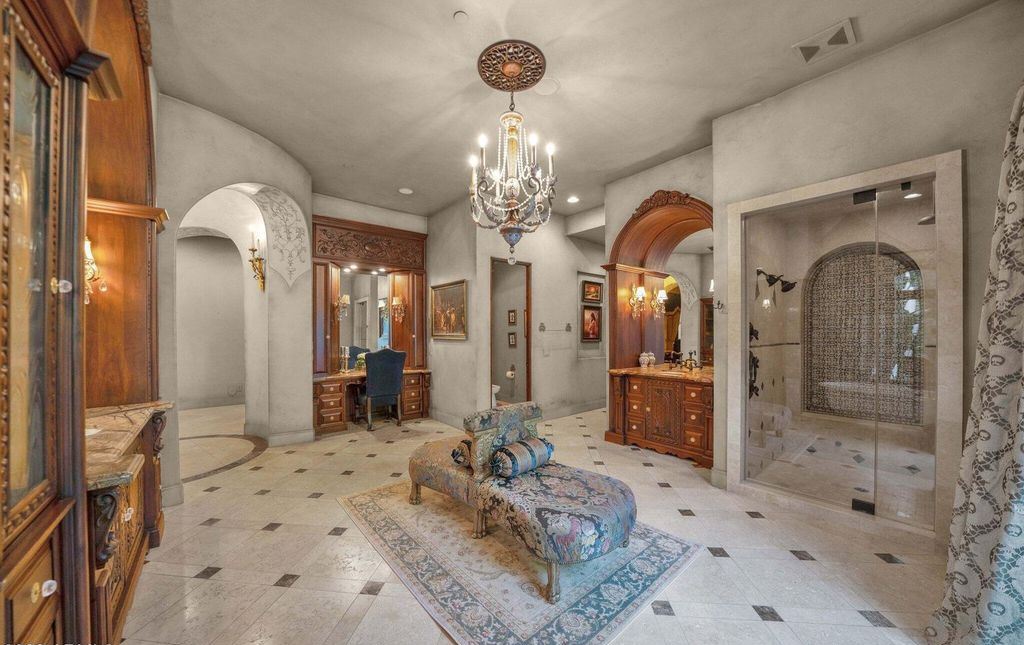 The Estate in Mesa, a an entertainer's dream designed for resort-like living with over 14,000 square feet of pure luxury offering a lush formally landscaped sanctuary and countless amenities is now available for sale. This home located at 1550 N 40th St UNIT 14, Mesa, Arizona