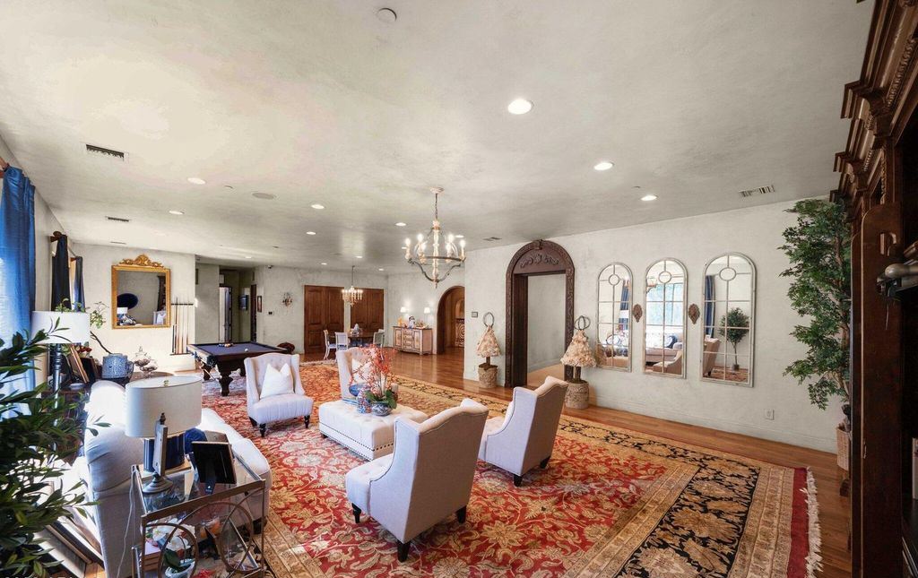 The Estate in Mesa, a an entertainer's dream designed for resort-like living with over 14,000 square feet of pure luxury offering a lush formally landscaped sanctuary and countless amenities is now available for sale. This home located at 1550 N 40th St UNIT 14, Mesa, Arizona